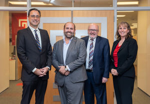 provost gregory mandel, board of visitors member christopher barnett, school of social work director phil mccallion, and interim dean jennifer ibrahim