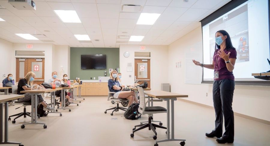 students use safe practices and social distancing during occupational therapy class