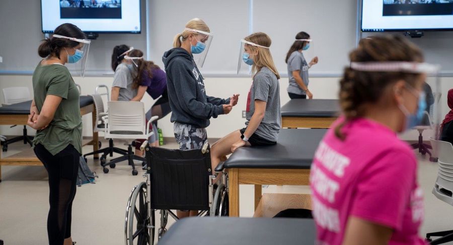 students use safe practices and social distancing during occupational therapy class