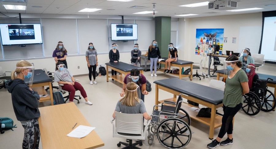 students use safe practices and social distancing during occupational therapy class