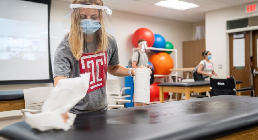 students use safe practices and social distancing during occupational therapy class