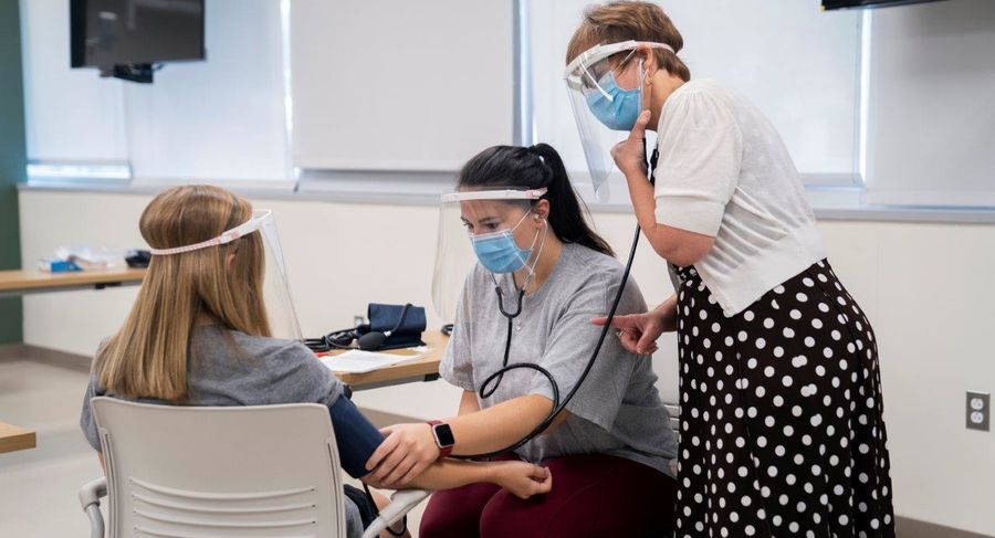 students use safe practices and social distancing during occupational therapy class