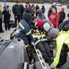 Students in the EMT course learn to backboard