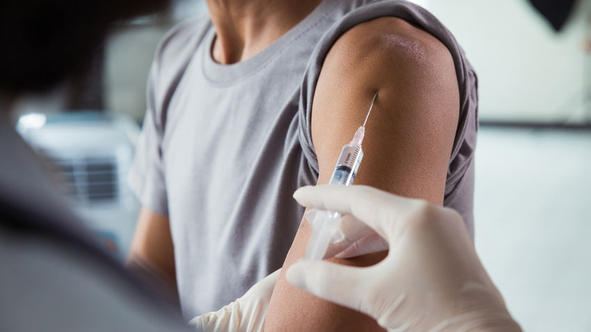 man receiving vaccination