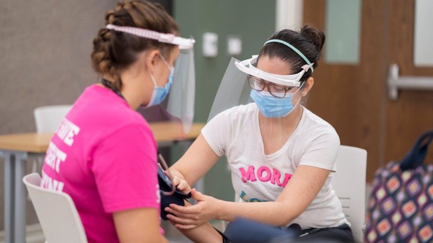 students use safe practices and social distancing during occupational therapy class