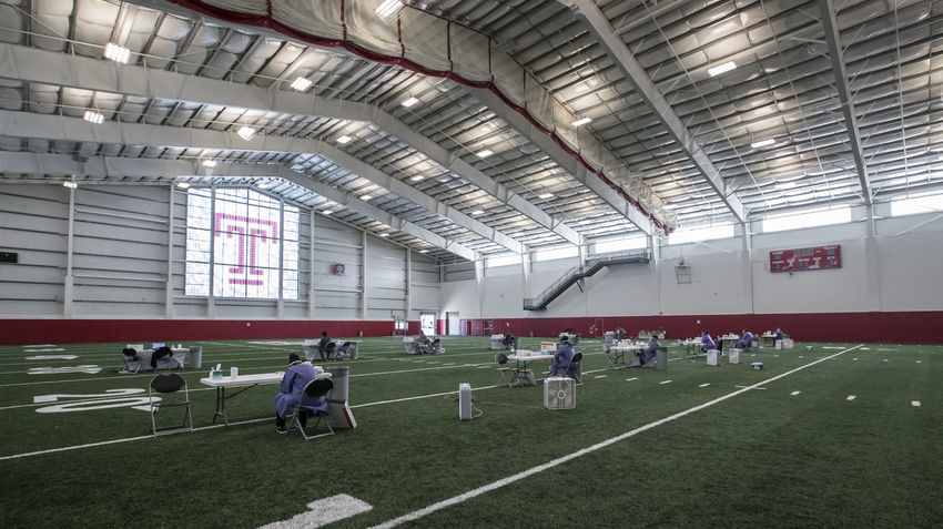 people testing for coronavirus at the STAR complex turf field