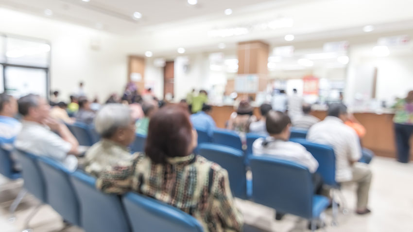 a blurred hospital waiting room