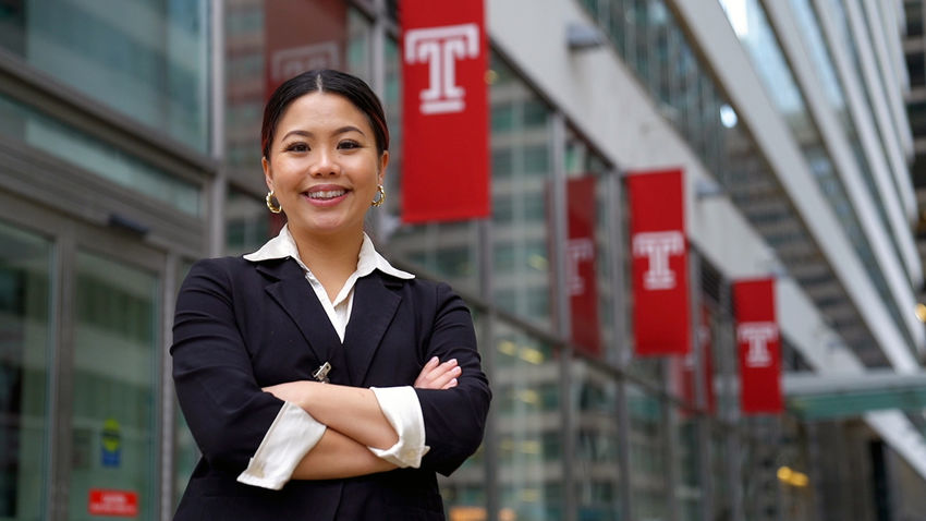 Gao Ly Vang standing in front of Temple Center City campus