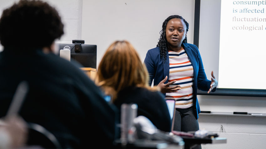 Lucy Wachira teaching in a classroom