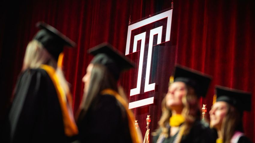 The Temple T on the graduation stage