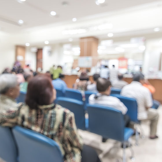 a blurred hospital waiting room