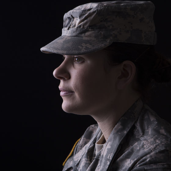 a closeup of a woman in the military