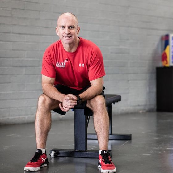 mike mcgurn sits in a fitness studio