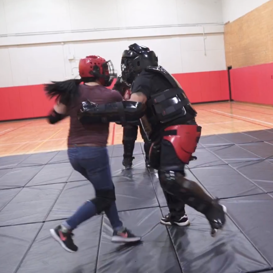 a student striking an instructor in the personal defense class